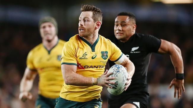 AUCKLAND, NEW ZEALAND - AUGUST 25:  Bernard Foley of the Wallabies makes a break during The Rugby Championship game between the New Zealand All Blacks and the Australia Wallabies at Eden Park on August 25, 2018 in Auckland, New Zealand.  (Photo by Anthony Au-Yeung/Getty Images)