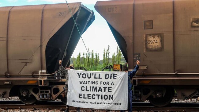 Activists celebrate the shutting down of the rail line to the port of Newcastle in November last year. Picture: Blockade Australia/Facebook