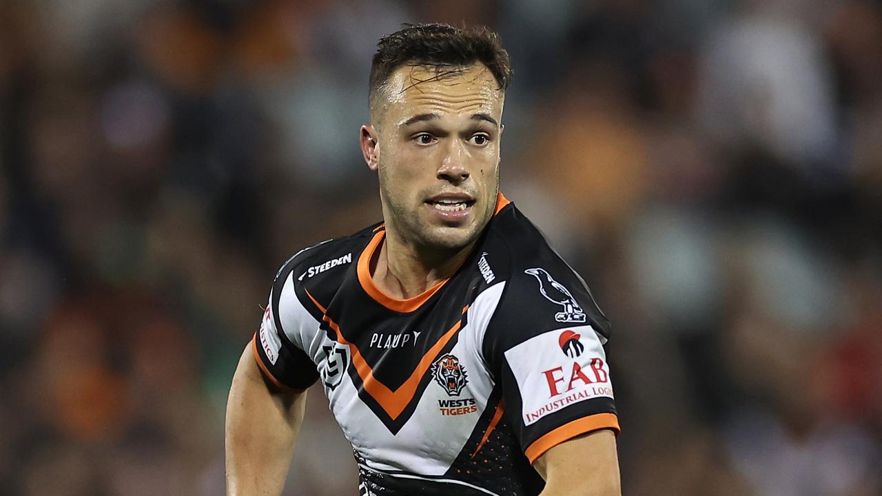 SYDNEY, AUSTRALIA – JUNE 02: Luke Brooks of the Wests Tigers runs the ball during the round 14 NRL match between Wests Tigers and Canberra Raiders at Campbelltown Stadium on June 02, 2023 in Sydney, Australia. (Photo by Cameron Spencer/Getty Images)