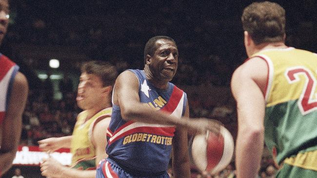 Harlem Globetrotters' Meadowlark Lemon prepares to put the moves on Washington Generals' Tim Burkhart during their basketball game at Madison Square Garden in New York in February 1993.  Picture: AP