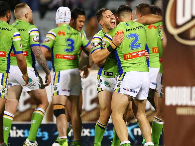 Aiden Sezer and Nikola Cotric celebrate winning in golden point against the Dragons.