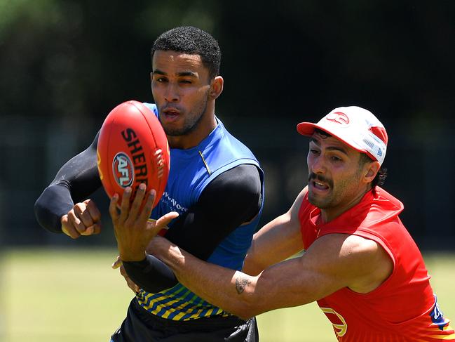 Touk Miller in action during a Gold Coast Suns AFL training session at Austworld Centre Training Ovals on December 15, 2021 in Brisbane, Australia. (Photo by Albert Perez/AFL Photos/via Getty Images)