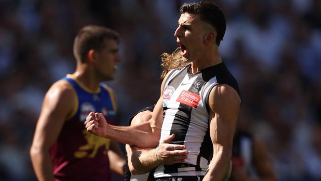 Nick Daicos of the Magpies celebrates after scoring the first goal. Photo by Robert Cianflone/AFL Photos/via Getty Images.