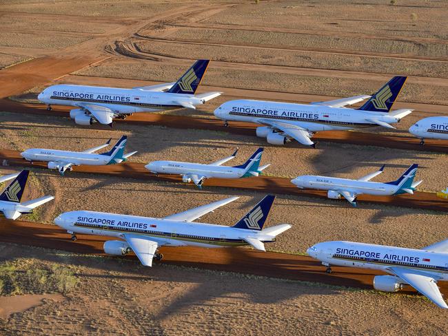 Some $5billion worth of Aircraft from around the world now being holed up in the desert near Alice Springs due to COVID-19 travel downturn30/04/2020: As the COVID-19 pandemic cripples the airline business, international carriers like Singapore Airlines has selected Alice Springs Airport as an ideal location to mothball it's fleet. Asia Pacific Aircraft Storage has undertaken the task of parking billions of dollars worth of aircraft in Australia's desert centre. PIC: Steve Strike for The Australian