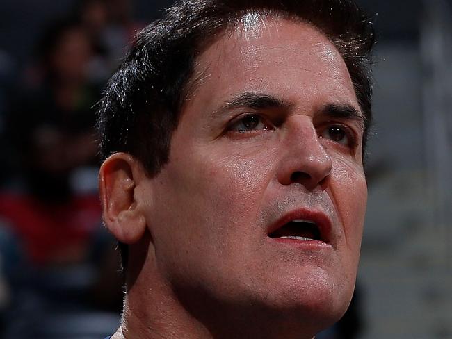 (FILES) In this file photo taken on December 22, 2017 Mark Cuban, owner of the Dallas Mavericks, reacts during the game against the Atlanta Hawks at Philips Arena in Atlanta, Georgia. NOTE TO USER: User expressly acknowledges and agrees that, by downloading and or using this photograph, User is consenting to the terms and conditions of the Getty Images License Agreement. - The NBA fined Dallas Mavericks owner Mark Cuban $500,000 on March 6, 2020 for a Twitter tirade ripping league referees and commissioner Adam Silver denied the club's protest of a February 22 loss in Atlanta. Cuban, a billionaire businessman who bought the Mavericks in 2000, was slammed with the hefty fine for his criticism and conduct detrimental to NBA officiating, also described in a league statement as an "effort to influence refereeing decisions during and after a game." (Photo by Kevin C. Cox / GETTY IMAGES NORTH AMERICA / AFP)