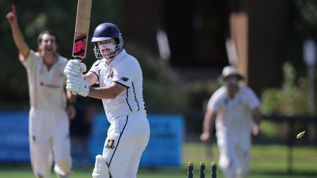 Marshall’s Phil Lang is bowled for 15 by Alexander Thomson's Angus Cranny. Picture: Mike Dugdale