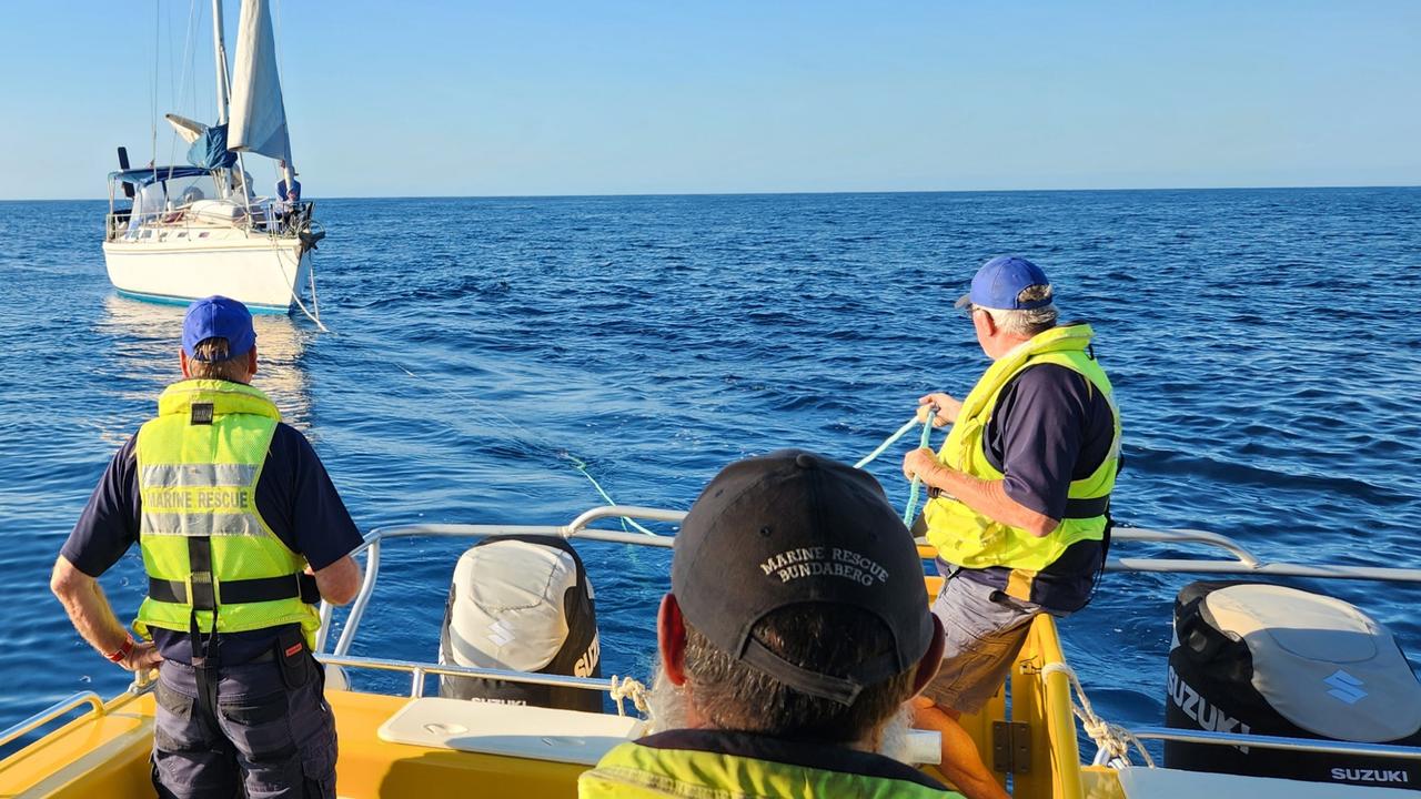 Volunteer Marine Rescue Bundaberg crew towing in the stranded yacht.