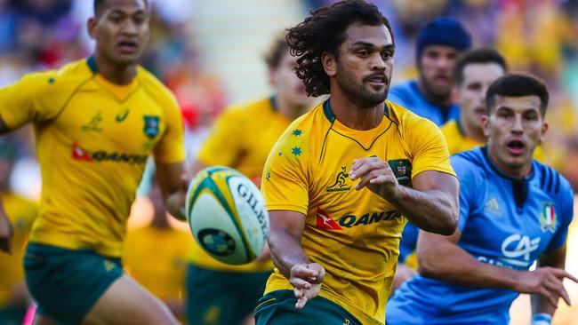 Karmichael Hunt plays for Australia during the international rugby match against Italy at Suncorp Stadium in 2017. Picture: AFP