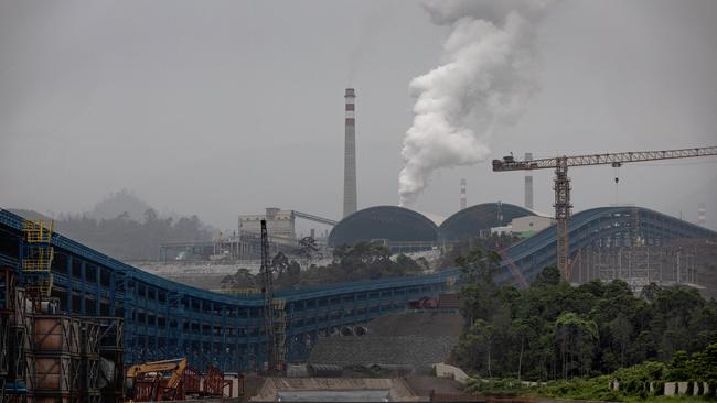 The belching chimneys of Indonesia Morowali Industrial Park (IMIP), a nickel processing complex in Morowali, Central Sulawesi, Indonesia. Picture: Garry Lotulung
