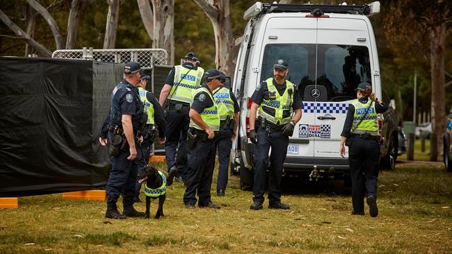 Police with sniffer dogs outside the Listen In festival at Bonython Park last year — they will return again for this year’s festival on Sunday. Picture: Matt Loxton