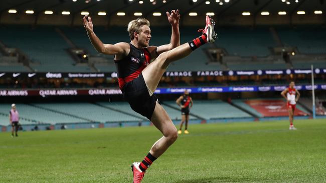 Darcy Parish of the Bombers kicks the winning goal.