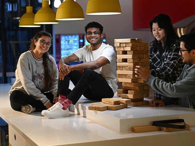 16/07/2023: Students L-R Isi Larraguibel  26,  Rowen Fernandopulle 23, Jaden Amba 19, and Rois Maullers,  25   relax at Scape student accomodation in South Bank, Brisbane. International students in Australia have surged to the highest levels in a decade, sparking concern that hordes of new entrants are exacerbating AustraliaÃ¢â‚¬â„¢s housing crisis. .  pic Lyndon Mechielsen/The Australian