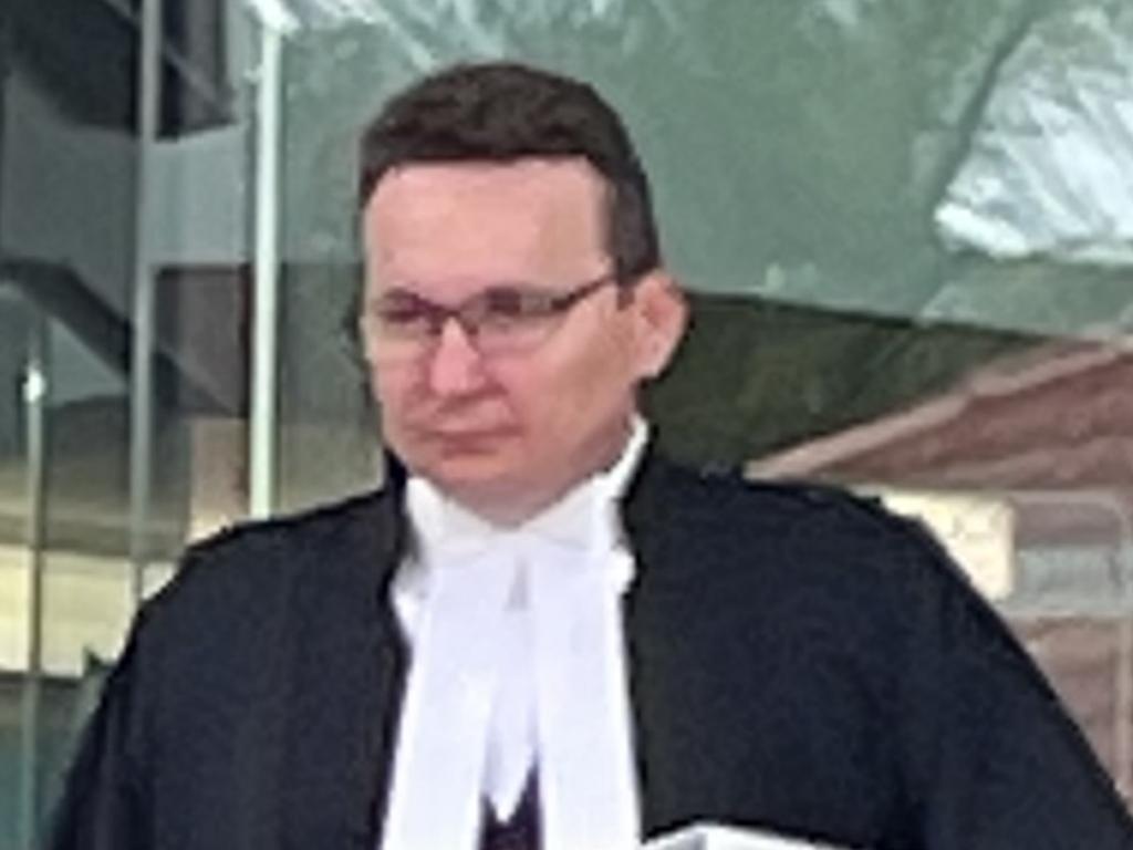 Defence barrister Scott Moon leaving Rockhampton courthouse.