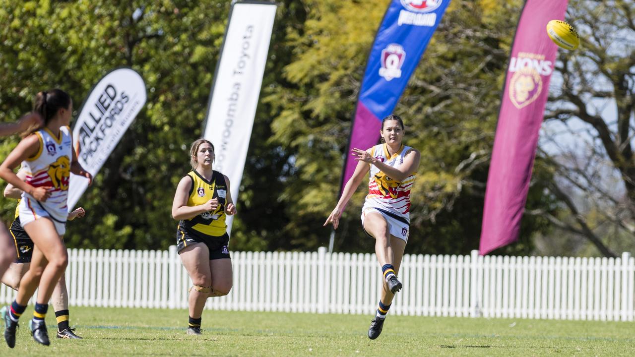 Aimee van der Hulst kicks for University Cougars against Toowoomba Tigers in AFL Darling Downs Toowoomba Toyota Cup senior women grand final at Rockville Park, Saturday, September 2, 2023. Picture: Kevin Farmer