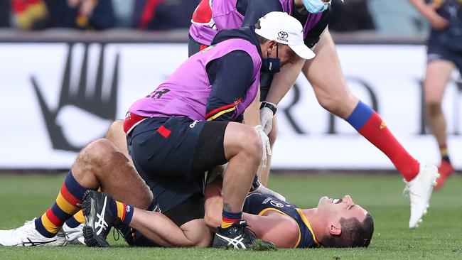 Medicos rushed to Walker’s aid. Picture: Sarah Reed/AFL Photos via Getty Images