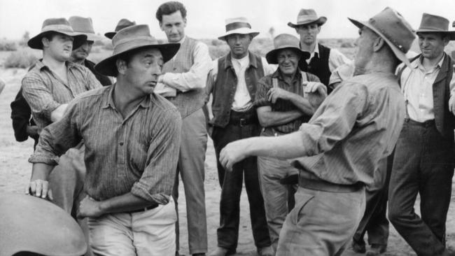 Production of film 'The Sundowners' at Corraberra station, Port Augusta, SA. American actor Robert Mitchum (l) in the famous brawl fight scene 23 Nov 1959. (Pic by staff photographer Hugh Ross)