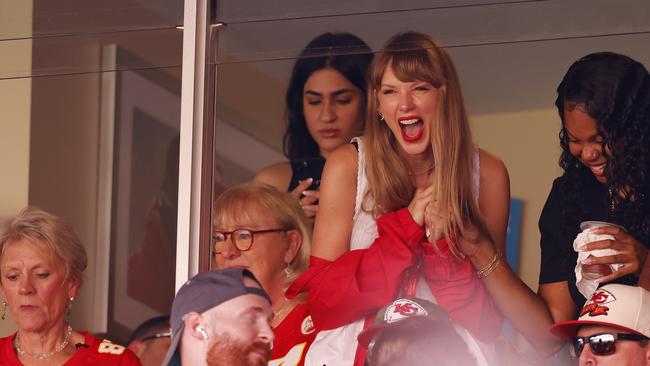 KANSAS CITY, MISSOURI - SEPTEMBER 24: Taylor Swift reacts during a game between the Chicago Bears and the Kansas City Chiefs at GEHA Field at Arrowhead Stadium on September 24, 2023 in Kansas City, Missouri. (Photo by David Eulitt/Getty Images)