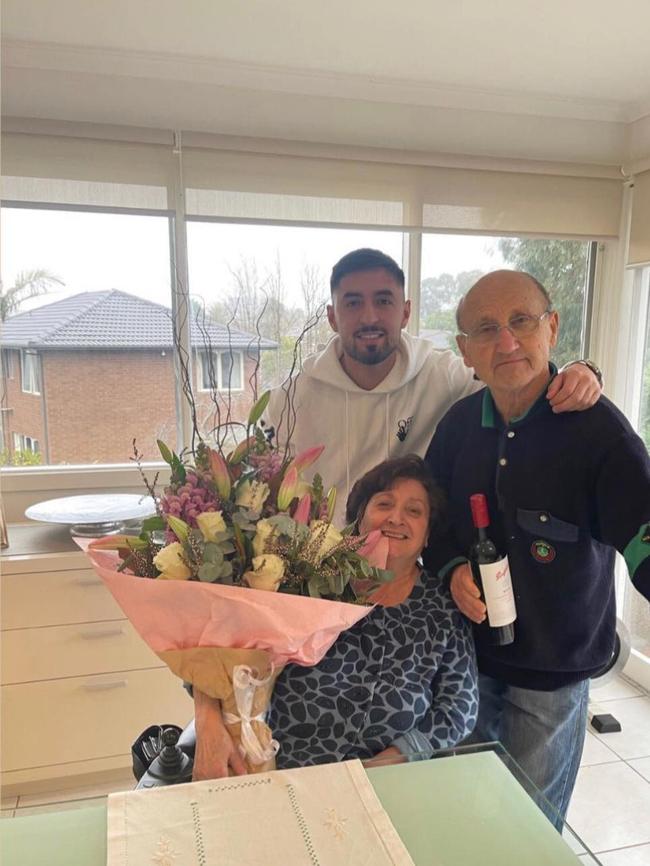 Mr Tanasi with his grandparents.