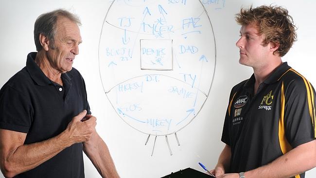 Graham Cornes talks tactics with Aldinga Sharks captain Daniel Dempsey. Picture: Tricia Watkinson