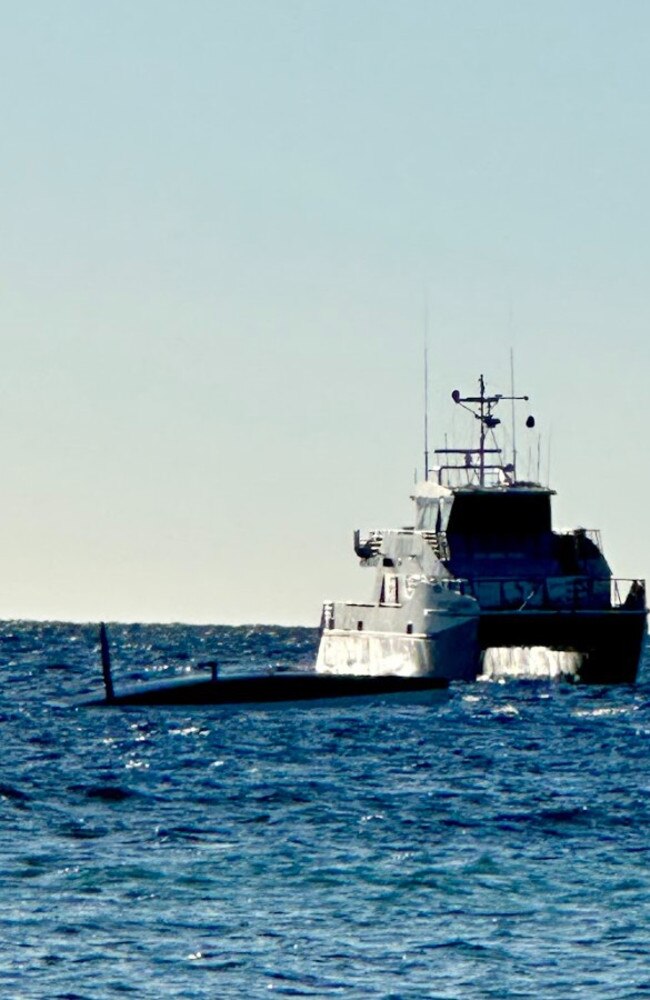 Police boat at Lady Elliot Island helping with search efforts.