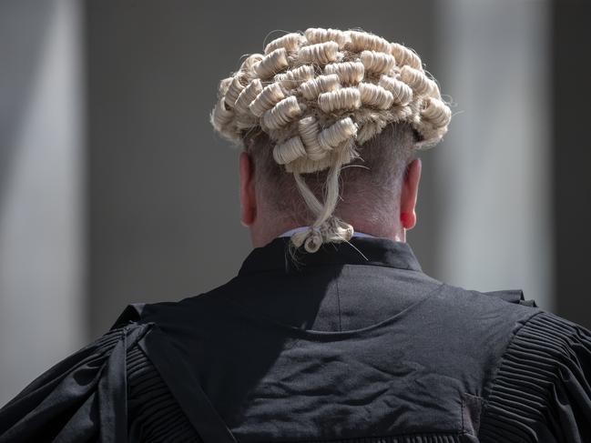 A barrister wears a wig at the Supreme Court in Brisbane, Tuesday, October 29, 2019. (AAP Image/Glenn Hunt) NO ARCHIVING