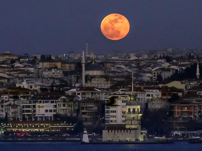 The moon above the Bosphorus straits in Istanbul. Picture: AFP