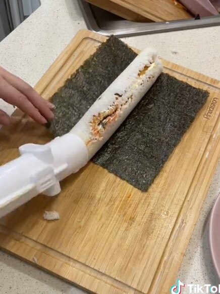 She showed how she used the sushi maker. Picture: TikToK/@amummatoanother