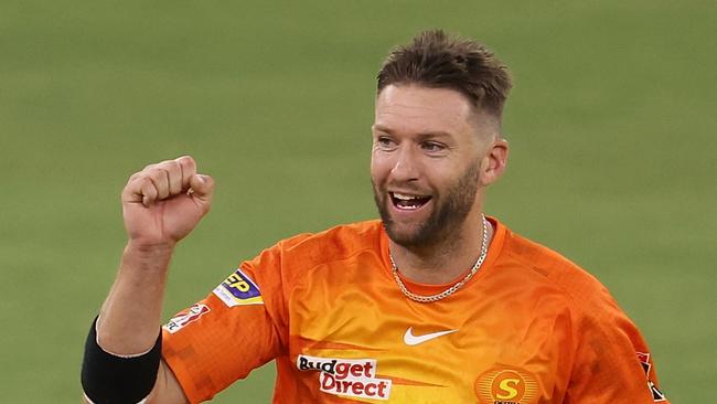 PERTH, AUSTRALIA - DECEMBER 08: Andrew Tye of the Scorchers celebrates the wicket of Jimmy Peirson of the Heat during the Men's Big Bash League match between the Perth Scorchers and the Brisbane Heat at Optus Stadium, on December 08, 2021, in Perth, Australia. (Photo by Paul Kane/Getty Images)