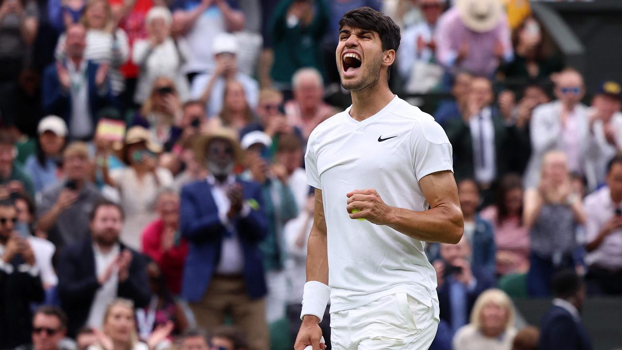 Spain's Carlos Alcaraz celebrates winning against France's Ugo Humbert. (Photo by HENRY NICHOLLS / AFP)