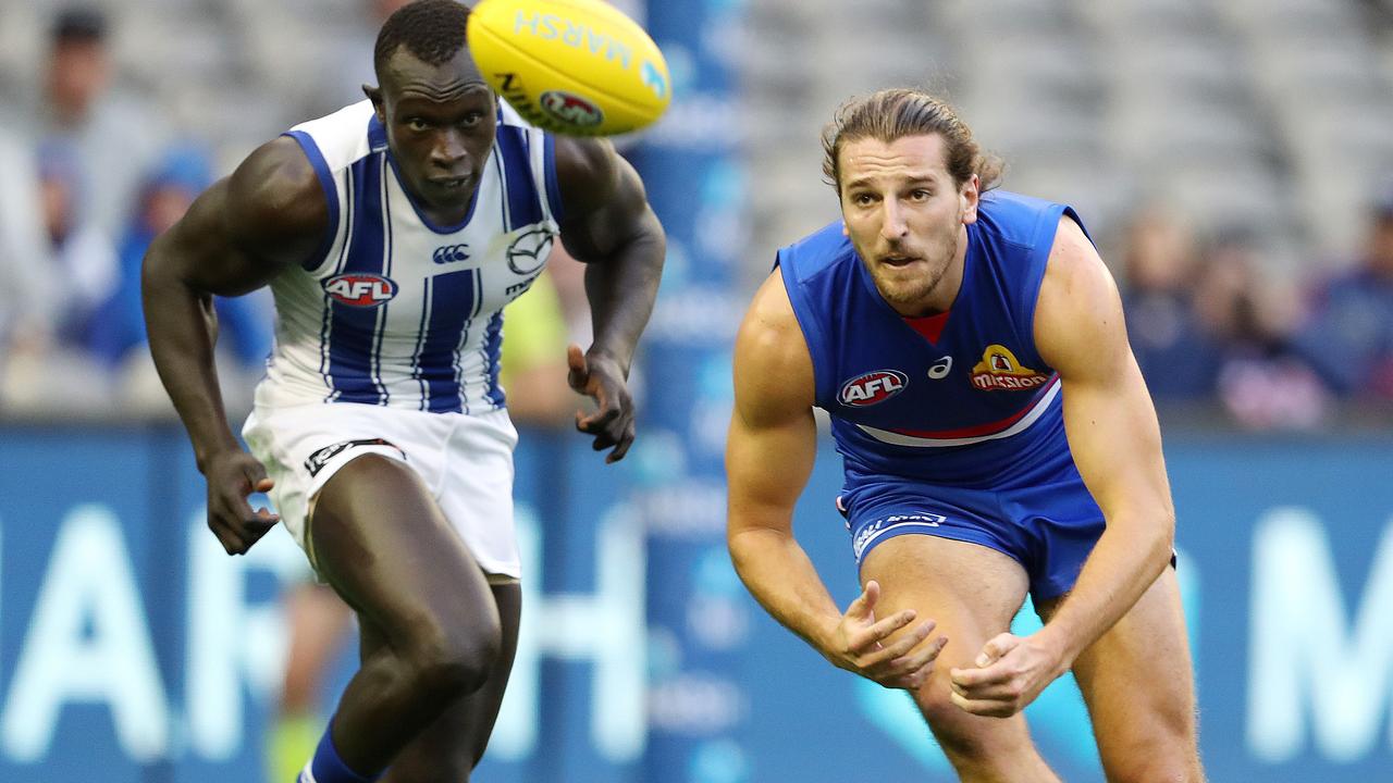 Marcus Bontempelli on the lead in front of Majak Daw. Pic: Michael Klein