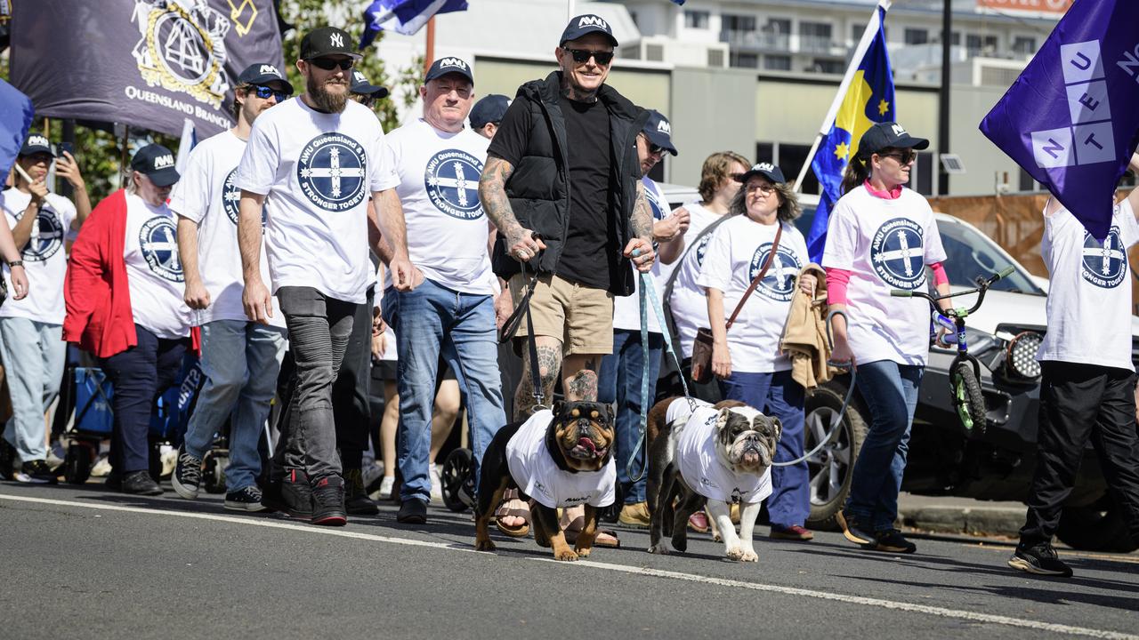 Troy Downie and his dogs Danzig (left) and Iggy march with the AWU in the Toowoomba Labour Day March, Saturday, May 3, 2025. Picture: Kevin Farmer