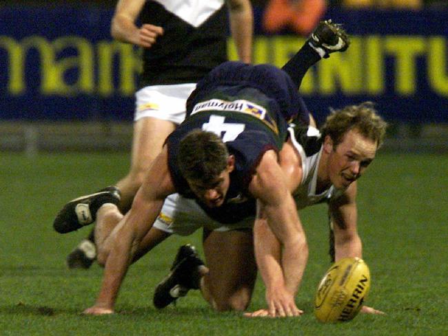 Ripper Rooster: Marc Greig (right) puts his body on the line for North Ballarat.