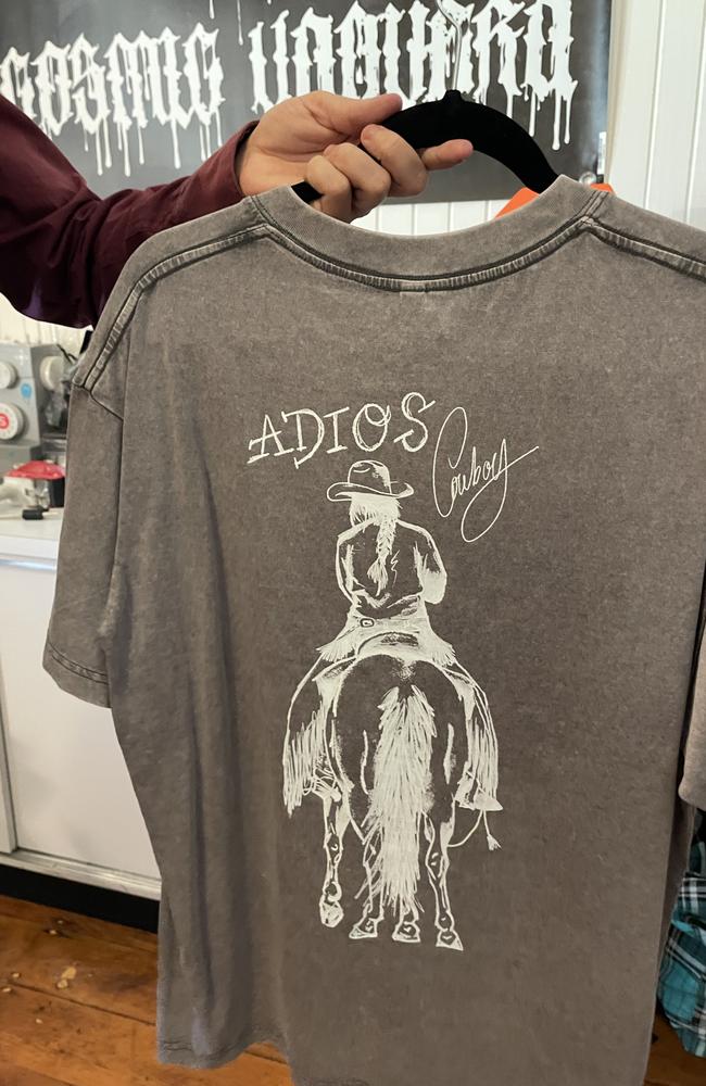 One of the popular grey and black t-shirts Miss Dries sells through her "goth and emo" cowgirl store, Cosmic Vaquera.