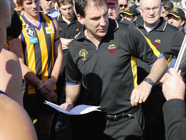 Mark Williams coaching Sandringham, a tense team manager Gerry Ryan to his right.