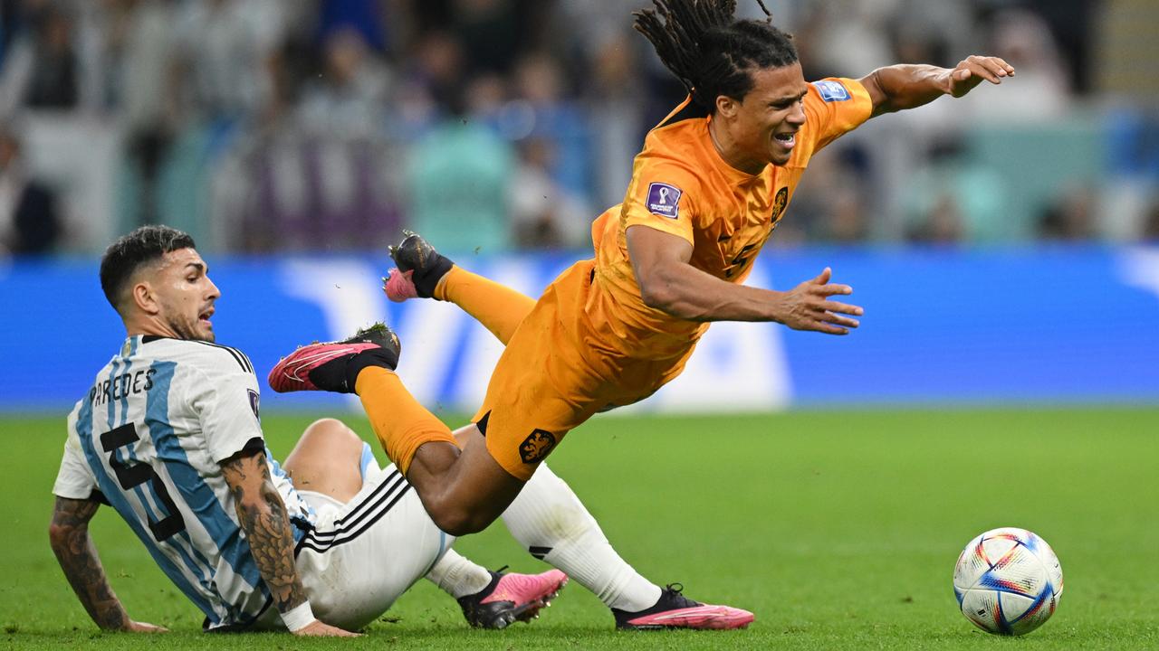 Leandro Paredes tackles Nathan Ake. (Photo by Matthias Hangst/Getty Images)