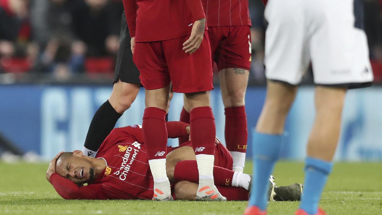 Liverpool's Fabinho lies injured.