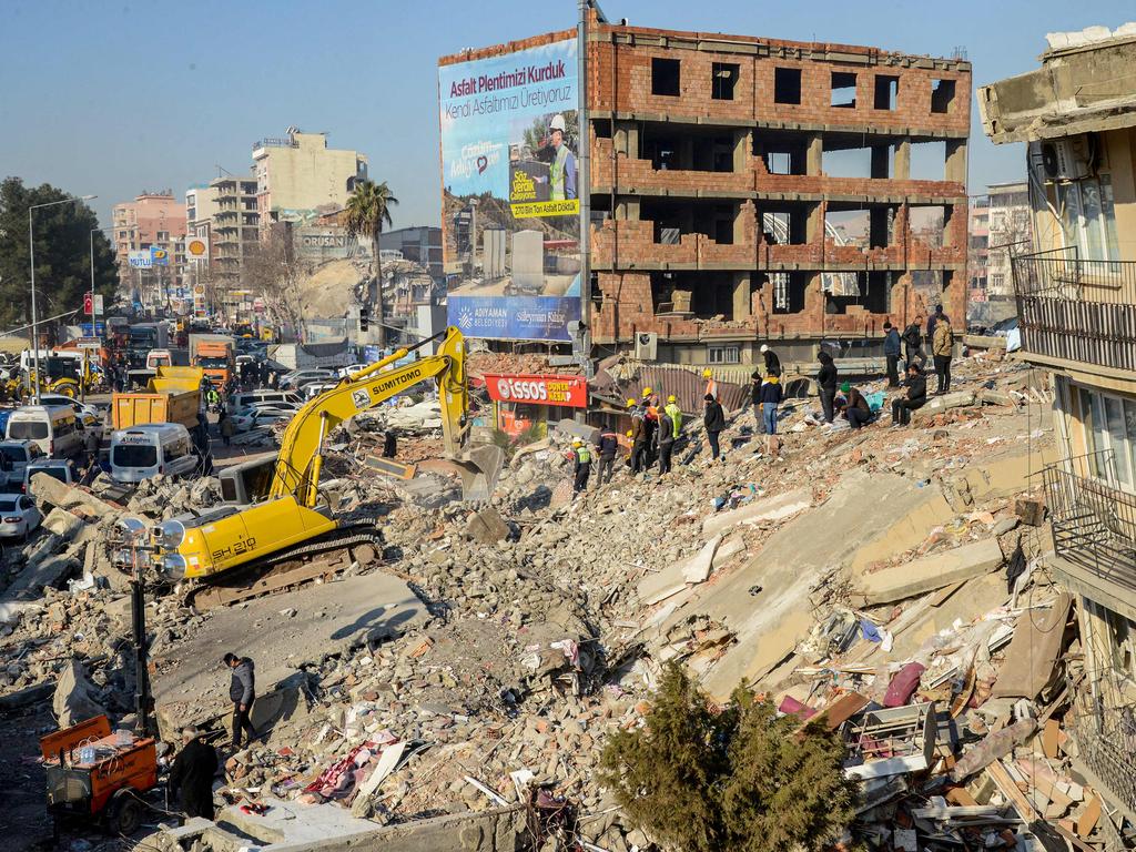 Rescuers search operations among the rubble in Adiyaman, Turkey. Picture: Ilyas Akengin/AFP