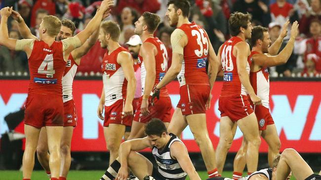 Sydney players celebrate after the final siren on Friday night. Picture: George Salpigtidis