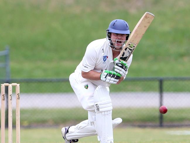 Ryan Pearson punches a ball into the on side during an innings for Plenty Valley. Picture: Hamish Blair