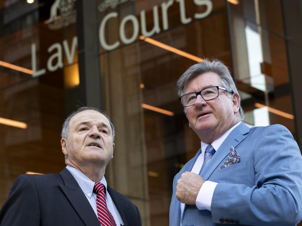 Steve Barrett (right) pictured talking to his supporter outside Supreme Court Sydney Picture: Monique Harmer