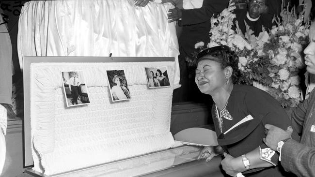 Mamie Till Mobley weeps at her son's funeral in 1955 in Chicago.