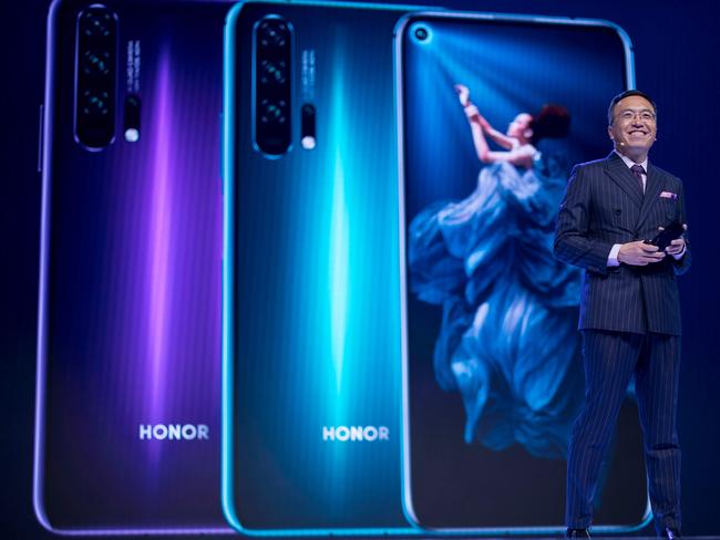 President of Honor, a sub-brand of Chinese telecommunications company Huawei, George Zhao, gives a keynote speech. The company has a short-term permit. Picture: AFP