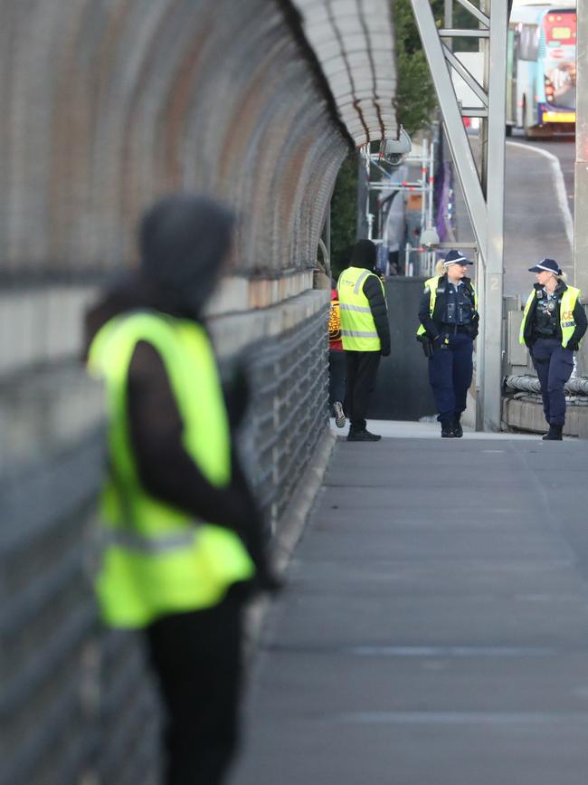 Police boosting security on the Harbour Bridge walkways on Monday morning. Picture: John Grainger