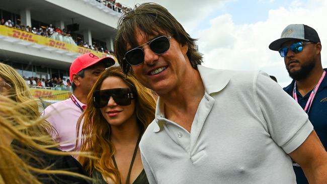 US actor Tom Cruise and Colombian singer Shakira attended the 2023 Miami Formula One Grand Prix. (Photo by CHANDAN KHANNA / AFP)