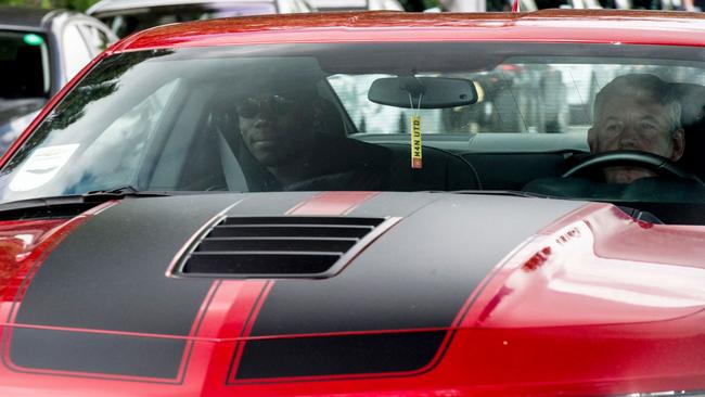 French footballer Paul Pogba arrives in a convoy of vehicles at Manchester United's Carrington training complex.