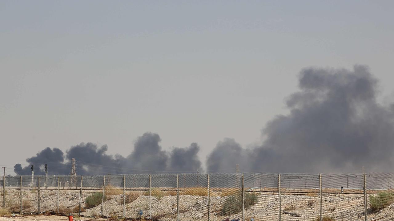 Smoke billows from an Aramco oil facility in Abqaiq about 60km southwest of Dhahran in Saudi Arabia's eastern province.