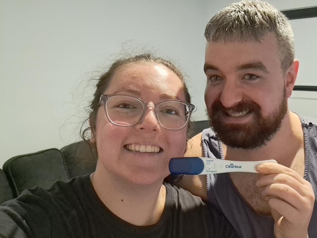 Imogen and Michael with positive pregnancy test.