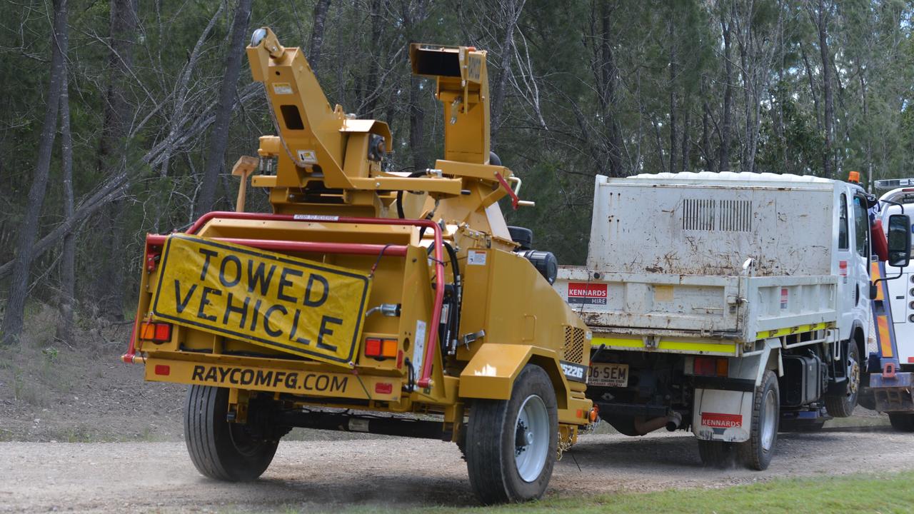 A wood chipper is removed from the property. Picture: Supplied