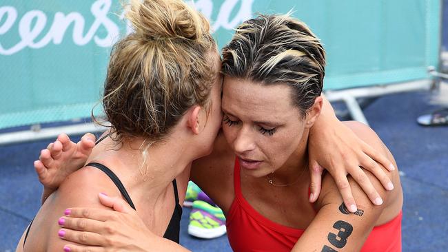 Georgia Miller (left) and Courtney Hancock (right) after finishing the 2017 Coolangatta Gold.