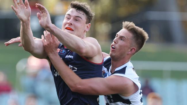 New St Kilda recruit Harry Boyd in action for Norwood competes against Diamond Creek recruit Bailey Griffiths of South Adelaide.